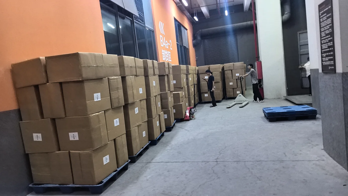 Palletized cartons staged in the loading corridor