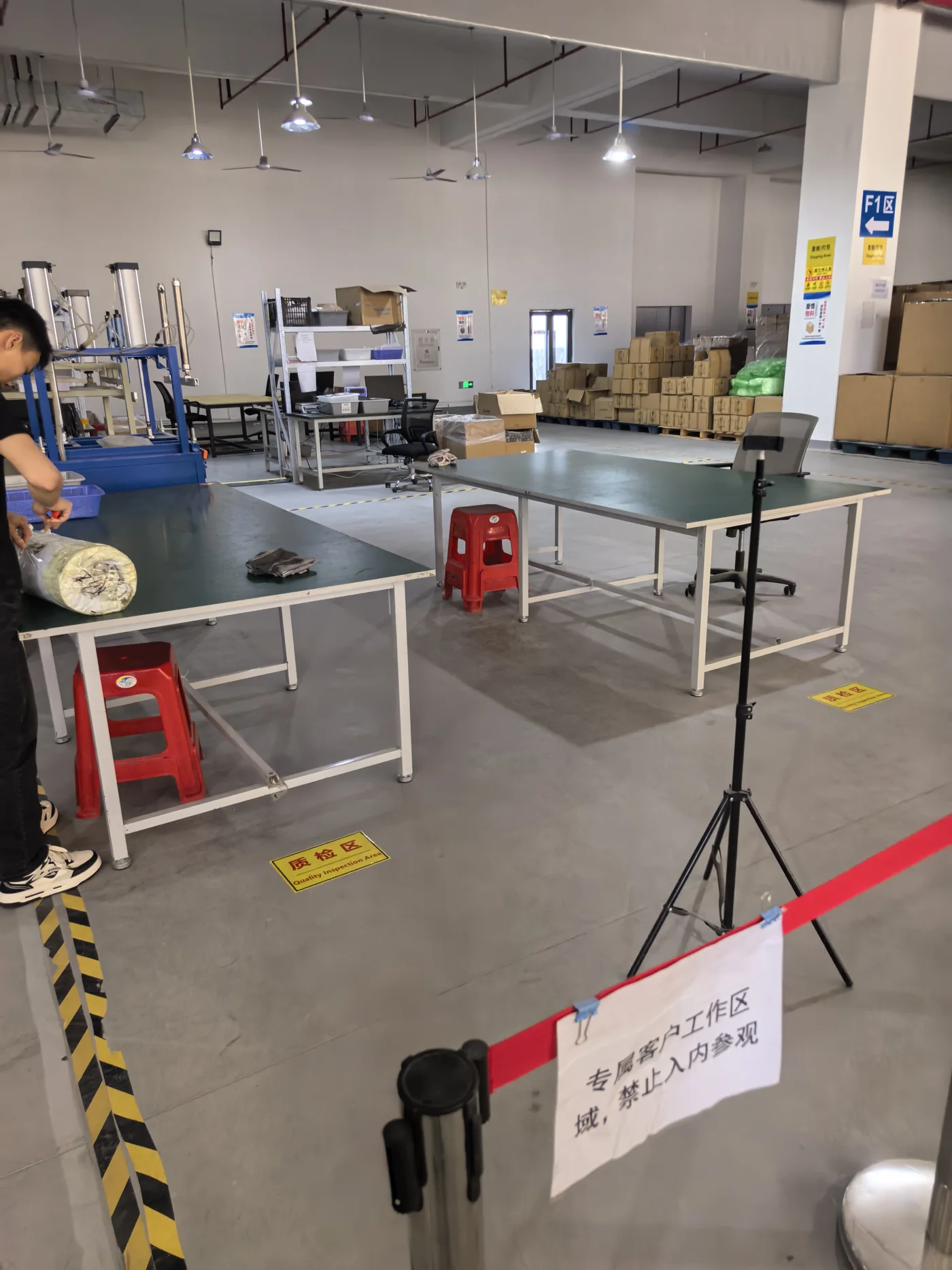 Worktables in the marked inspection area